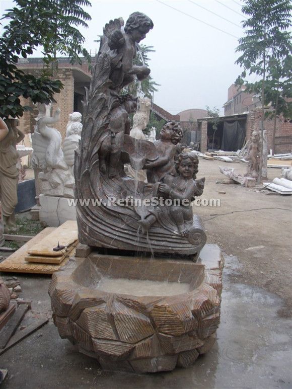 antique water fountain with kids