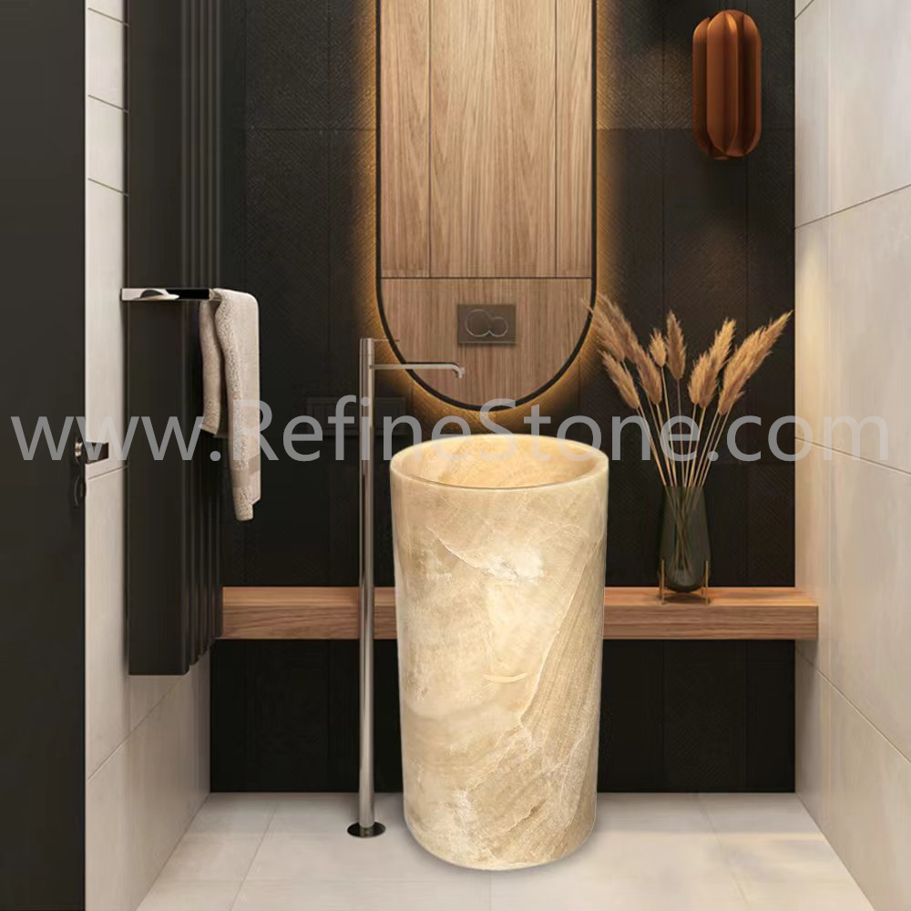 Yellow onyx pedestal sink