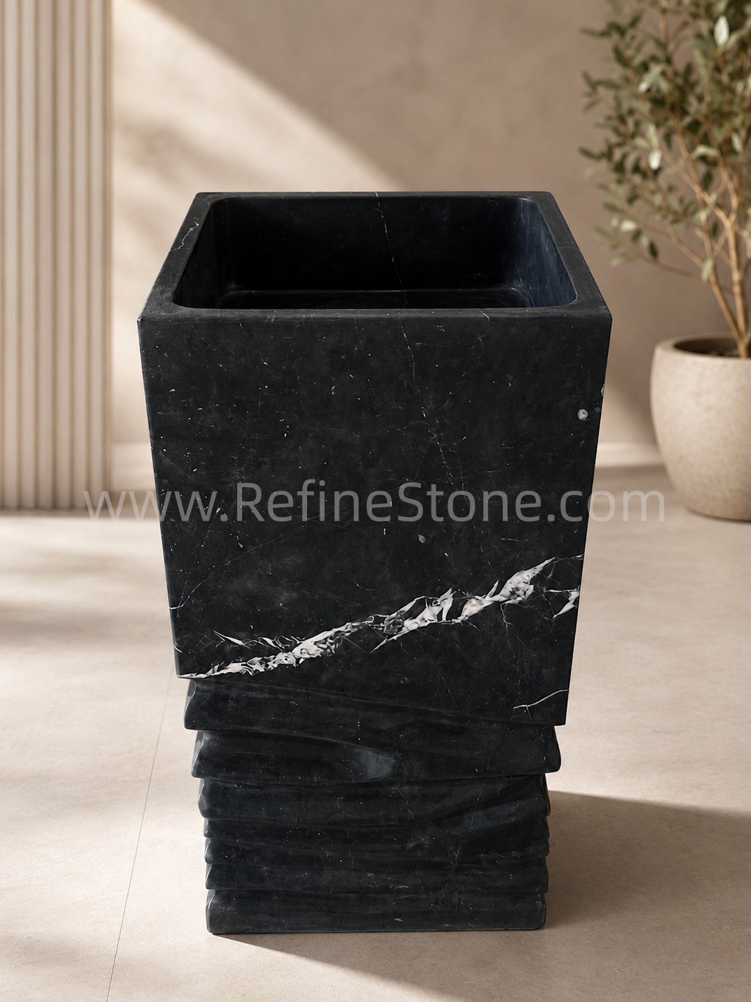 Nero Marquina pedestal sink